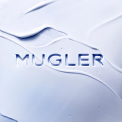 Mugler Angel Body Lotion creamy texture demonstrates lasting moisture on skin.
