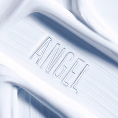 Mugler Angel fragrance bottle with cream hints at signature scent.