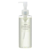 MUJI mild cleansing oil bottle pour shows silky texture for makeup removal.
