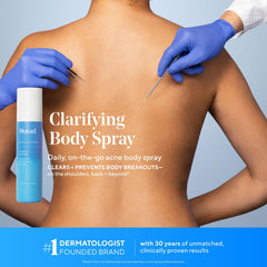 Murad Clarifying Body Spray applied to elbow area demonstrates reach