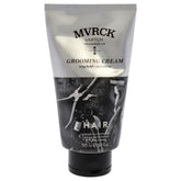 mvrck grooming cream tube in hand for easy styling with natural shine.