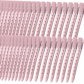 Mythos pink duck-bill clip pack keeps hair tidy during styling.