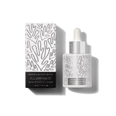 Naked & Thriving Illuminate BC+ bottle demonstrates hydrating, radiant skin