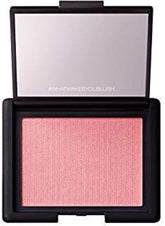 NARS Orgasm blush compact reveals peachy-pink with golden shimmer for natural glow.