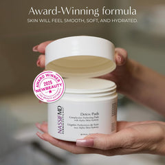 NassifMD Exfoliating Detox Pad on skin – quick cleansing and brightening prep.