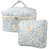 NATINSA cute makeup bag navy blue floral closeup with premium quilting and organized compartments.