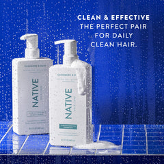 Native Cashmere & Rain shampoo and conditioner in shower scene ready for everyday cleansing and conditioning.