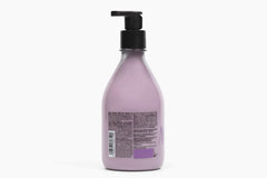 Natura Açaí Body Lotion applied to forearm for lasting moisture.