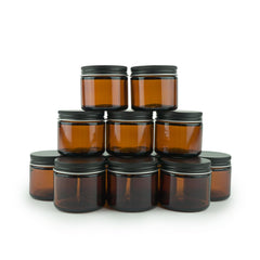 Nature Packaged amber glass 2oz jar side view, travel-friendly beauty container.
