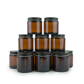 Nature Packaged amber jar 4oz closeup shows durable glass for cosmetics and travel storage.