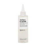 NatureLab.TOKYO Perfect Clean Sake Rinse bottle on a bathroom shelf for balanced scalp hydration.
