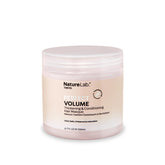 NatureLab.TOKYO Perfect Volume Masque bottle pour enables even distribution for fuller-looking hair.