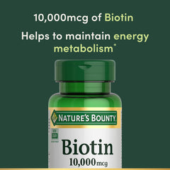 Nature's Bounty softgel beside a coin to show size and ease of swallowing, aiding dosing confidence