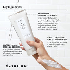 Naturium KP body scrub jar showing key exfoliating ingredients