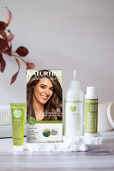 Naturtint 5G Light Golden Chestnut during application for even, natural-looking coverage.
