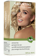Naturtint light blonde root retouch cream application demonstrates quick root blending for seamless color.