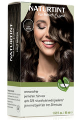 Naturtint Light Brown Root Retouch Cream applied to roots for seamless blending