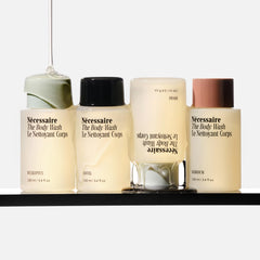 Nécessaire Body Wash Discovery Collection ingredients label highlighting vitamins and niacinamide