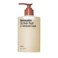 Nécessaire The Body Wash Olibanum bottle with rich foam for radiant cleansing.