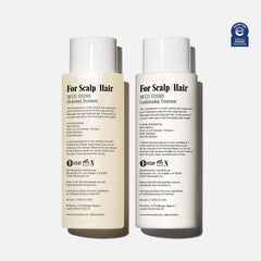 Nécessaire Hair Duo conditioner bottle — lightweight conditioning for smooth, manageable hair.