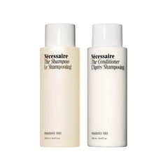 Nécessaire Hair Duo shampoo bottle — fragrance-free cleansing for sensitive scalps.