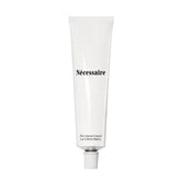 Nécessaire Hand Cream tube closeup showing fragrance-free formula for sensitive skin
