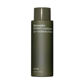 Nécessaire Rosemary Conditioner bottle pouring for daily strengthening and detangling