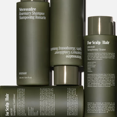 Nécessaire Rosemary Conditioner bottle highlights detangling and softening for smoother styling.