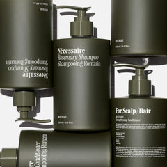 Nécessaire Rosemary Hair Duo rosemary oil droplet highlighting scalp nourishment.