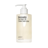 Nécessaire The Body Oil bottle pour enabling smooth, hydrated skin.
