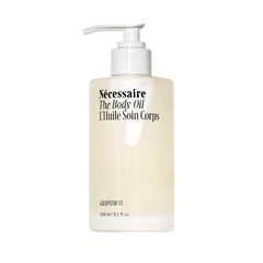 Nécessaire The Body Oil bottle pour enabling smooth, hydrated skin.