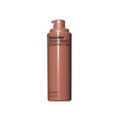 Nécessaire The Body Vitamin C Serum bottle with pump for daily radiance and even tone