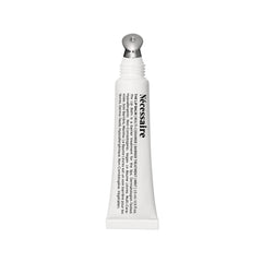 Nécessaire The Lip Balm tube closeup highlights glossy packaging and lip hydration benefits.