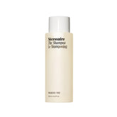 Nécessaire The Shampoo bottle front view highlighting fragrance-free formula for sensitive scalps.