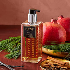 NEST New York holiday liquid soap fragrance notes highlight festive citrus-woody profile.