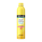 Neutrogena Beach Defense Spray on skin provides fast-absorbing SPF 30 protection during a sunny beach day.
