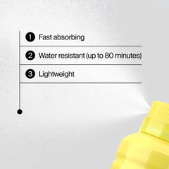 Neutrogena Beach Defense Spray on the body shows water-resistant protection during swimming.