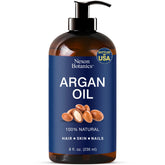 Nexon Botanics Argan Oil bottle shows 100% natural Moroccan oil for hair nourishment.