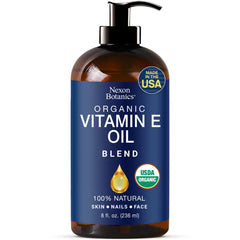 Nexon Botanics Organic Vitamin E Oil Blend bottle for deep hydration and smooth skin.