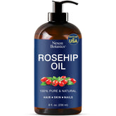 Nexon Botanics Rosehip Oil bottle close-up for nourishing facial skin.