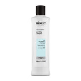 NIOXIN front packaging showing clear medicating shampoo for dandruff control