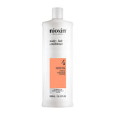 NIOXIN System 4 front packaging showing bottle and label benefits