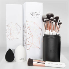 Niré Beauty White 15piece brush set case, organized for on-the-go makeup routines.