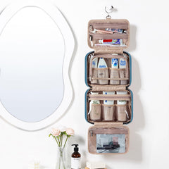 NISHEL travel toiletry bag lake blue hanging-on-hook displays hands-free organization.