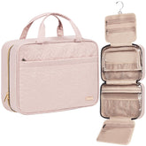 NISHEL travel toiletry bag pink holds full-size shampoo for easy hotel-room access.