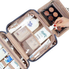 NISHEL interior compartments with elastic straps securing bottles upright.