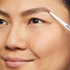 No7 pencil applied with spoolie demonstrating natural brow shaping