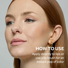 No7 lipstick in hand scale demonstrating compact size benefit: handbag-friendly