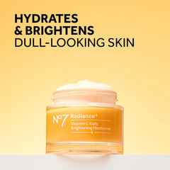 No7 Radiance vitamin C cream swirl on skin illustrating instant glow and absorption.