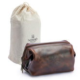 NomadCraftsCo premium leather travel toiletry bag with durable hardware for reliable travel